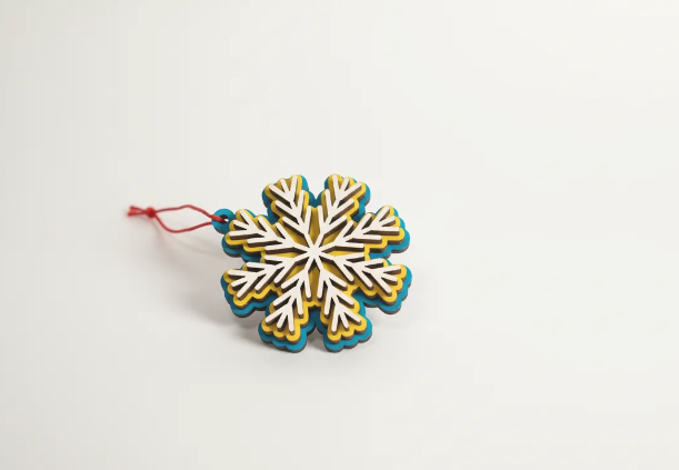 copo de nieve pintado con niveles y paneles de corte laser 3d