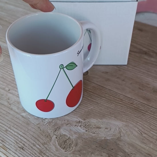 Taza de cerezas minimalista
